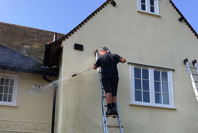 Scott Regan pressure washing house rendering