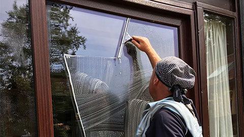 Scott Regan cleaning conservatory windows
